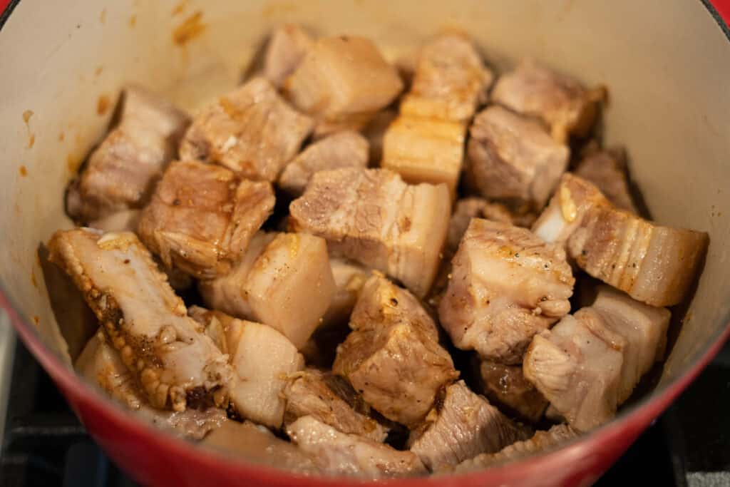 Pork cut into chunks and marinated. 