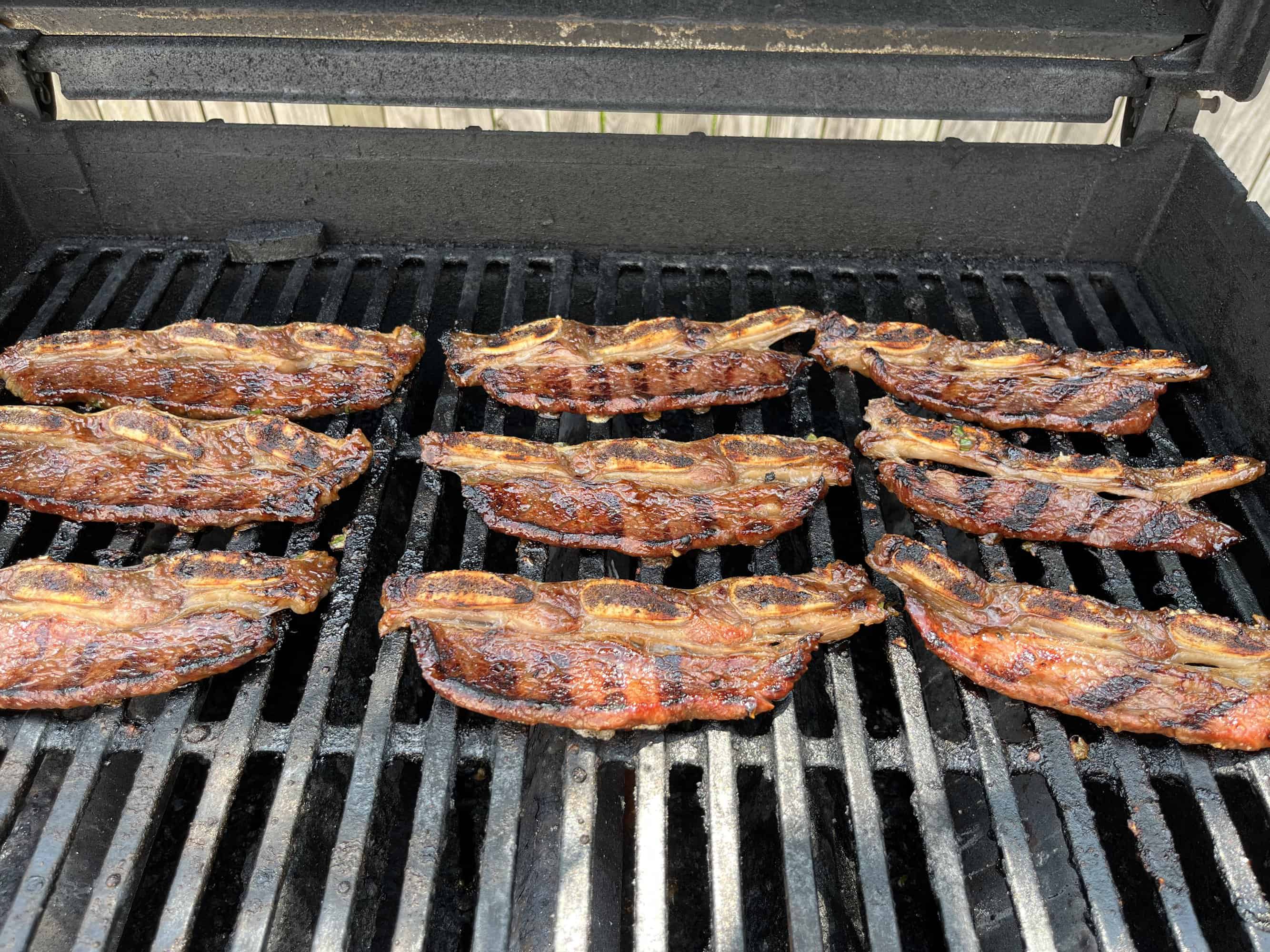 Kalbi being cooked on the grill
